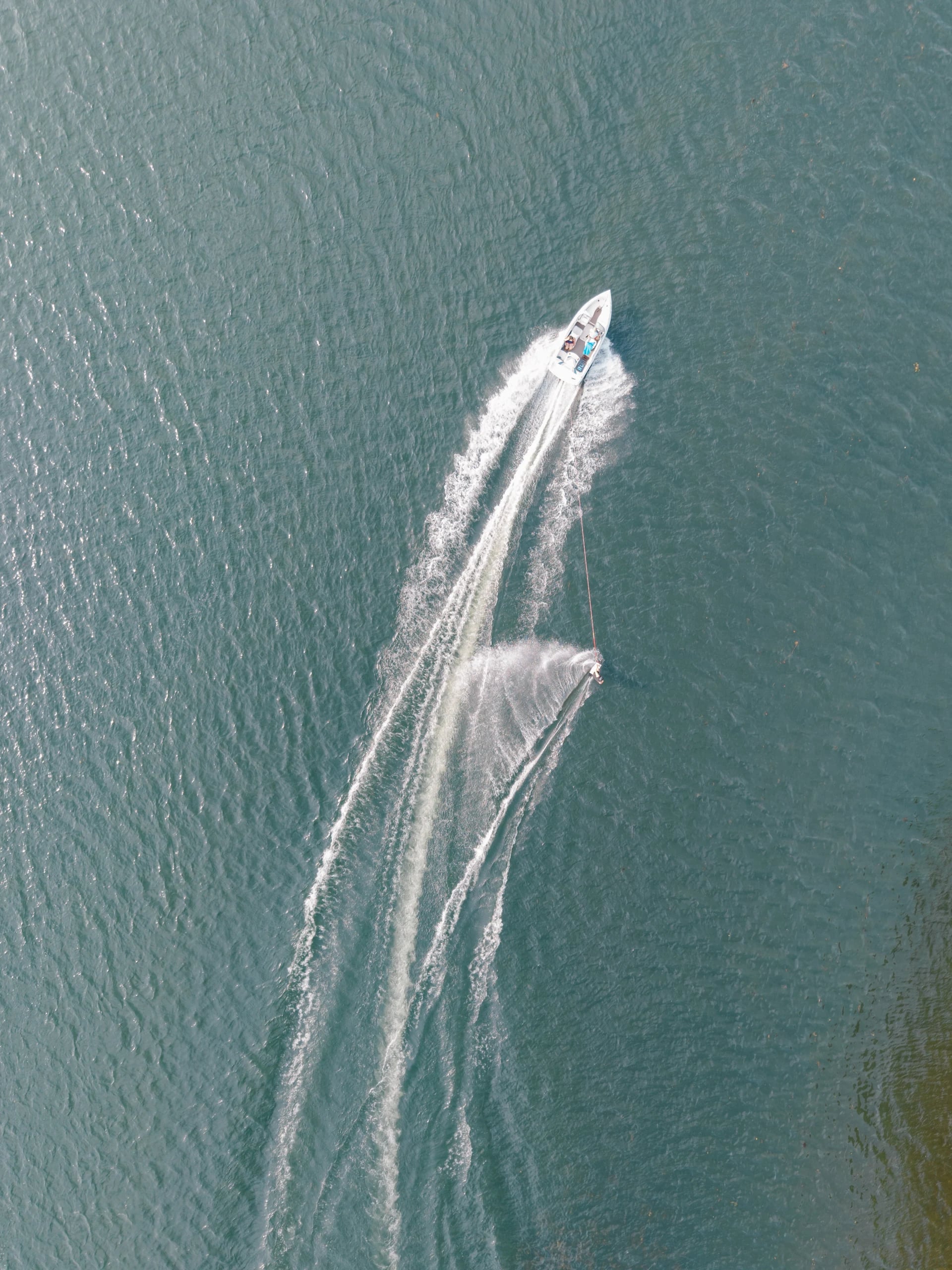 Aerial view of a boat on the private lake at Lake Pearl Wrentham